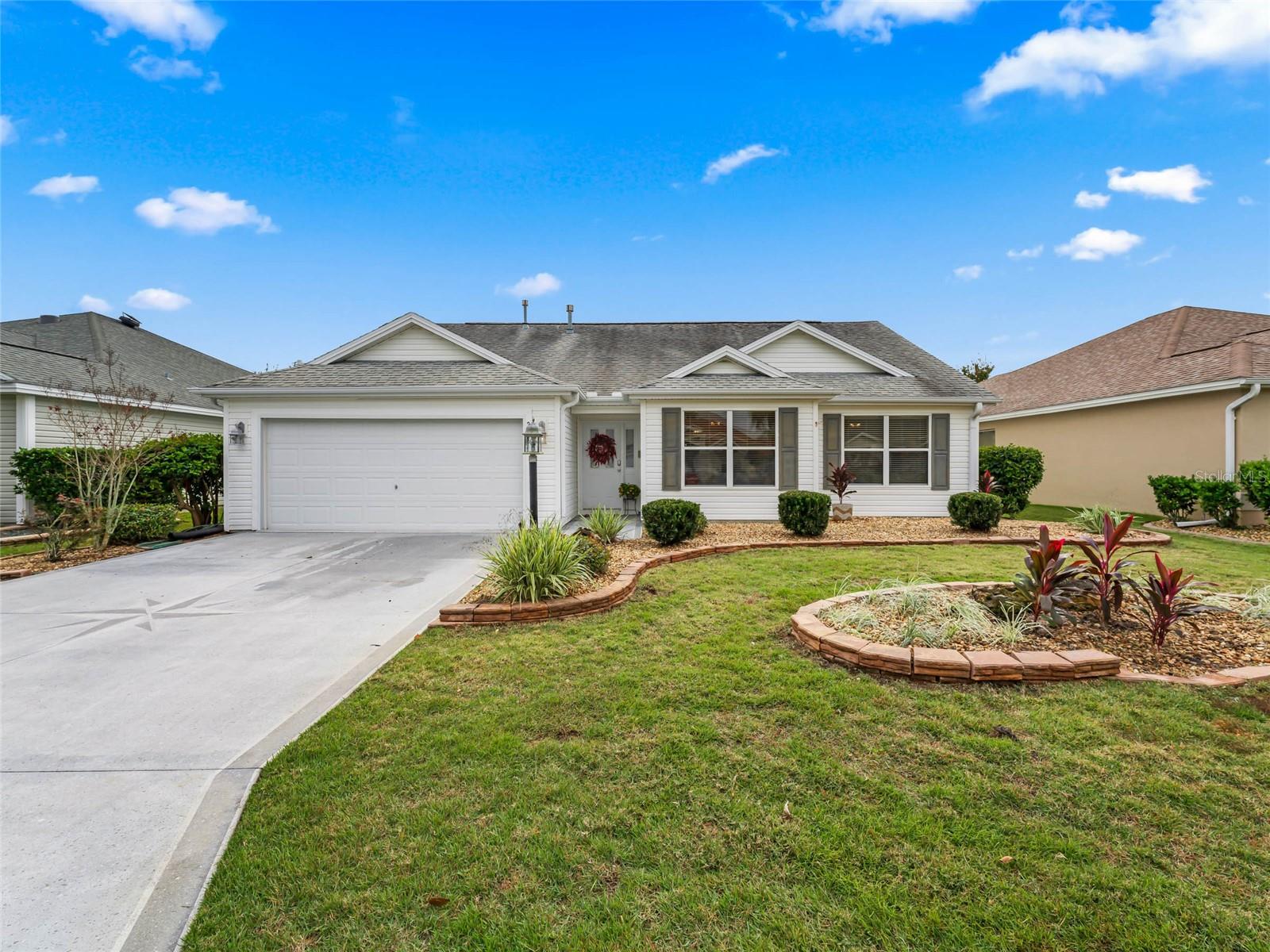 TURNKEY!!! WHISPERING PINE MODEL!!!!GREAT LOCATION!!!! NEAR 466 (RESTURANTS, PUBLIX AND WALMART) FULLY TURN KEY, ****WATER FRONT AND BOND PAID **** Centrally located in the Villages of Tall Trees. Minutes to Sumter Landing or Southern Trace shopping& restaurants, WITH A VIEW OF PEACE AND SERENITY DESGNER Must see this fully furnished 2 bedroom 2 bath PLUS DEN! This is your FULL TIME HOME or home away from home. This property is located only minutes from Spanish Springs and Lake Sumter Landing. It is fully furnished with everything you need. Enjoy your mornings on the enclosed lanai looking at the beautiful lake, and enjoy your evenings with free live entertainment at one of the 3 squares. This property includes a 4 seater golf cart.