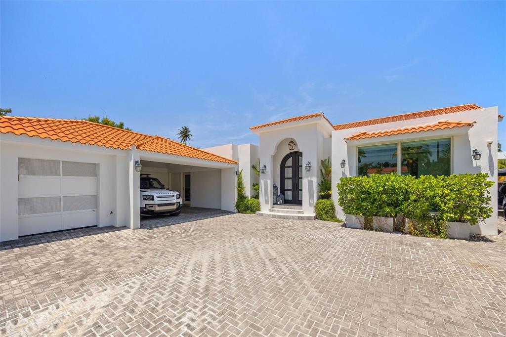 This impeccably renovated and beautifully furnished single story turnkey home is located in Dorado Beach East, a secure, private gated residential development within the the Dorado Beach Ritz Carlton Reserve resort community, Puerto Rico’s premier residential resort development.  A  light-filled open floor plan with dramatic high ceilings, architectural windows and exquisite Italian flooring create the perfect setting for this exceptionally designed home.  If you are looking for a property that is ready to move in, this stunning home is new to the market and not to be overlooked.
Approximately 5,100 square feet - very private lot on cul-de-sac. Beautifully appointed formal living and dining rooms as well as informal entertaining and dining areas. A newly renovated state of the art designer kitchen with top of the line equipment, double large format marble islands and timeless Italian stone countertops. Spacious and airy family-media room opening to terrace and pool area. Wet bar with a beautiful full slab marble island. Spacious master bedroom with a spectacular walk-in closet, luxurious en suite bathroom showcasing double vanities, double shower and a freestanding tub. Two secondary bedrooms, each with a private bathroom and connected by a study/play sunroom with a full ceiling skylight. Elegant and comfortable home office with executive desk plus two work stations. Private guest suite with independent entrance, kitchenette, full bathroom and lounge/gym area. Heated saltwater swimming pool and beautifully designed tropical landscaping with automated lighting and irrigation. Superb built-in custom storage closets, large functional laundry room, side entryway cubby and storage area, carport. High speed satellite internet, a state of the art integrated audiovisual system including custom ceiling speakers, automated blinds, security cameras and central air conditioning all easily controlled from your mobile phone. Full-power generator, solar water heating panels and water cistern.Â
Enjoy the lifestyle that only Dorado Beach Resort can offer. Walk or ride your golf cart to the beach and enjoy exclusive access to the amazing Dorado Beach Resort and its amenities – pristine beaches, world renowned TPS golf courses, tree lined biking  and walking trails, an aquatic adventure park and one-of-a kind lifestyle activities including a myriad of water sports, an alluring spa sanctuary and high end fitness center. An easy 30-minute drive from San Juan, Dorado Beach will exceed your expectations.
