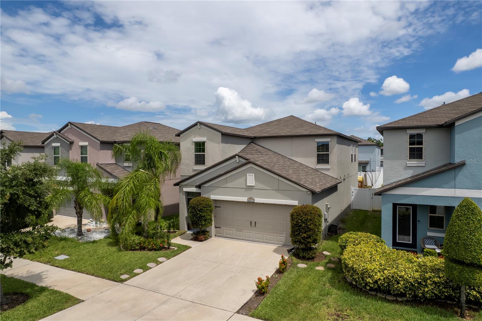 Welcome to this beautiful and spacious two-story home located in the highly sought-after Ayersworth community in Wimauma, Florida. Boasting 5 bedrooms, 2.5 bathrooms, and 2,881 square feet of living space, this property offers the perfect blend of comfort, functionality, and modern living for families of all sizes. As you enter, you are greeted by an open-concept floor plan that seamlessly connects the living, dining, and kitchen areas, creating an inviting space for both daily living and entertaining. The kitchen is generously sized, featuring all appliances, plenty of cabinetry, and a large countertop area that makes cooking and gatherings a joy. The primary suite is conveniently located on the first floor, offering privacy and comfort with a spacious walk-in closet and a private en-suite bathroom. Upstairs, you will find four additional bedrooms, each offering ample space and natural light. One of the upstairs bedrooms also includes its own walk-in closet, providing extra storage and versatility. This home also features a two-car garage, water softener system, a fully fenced backyard, and a private patio, perfect for outdoor dining, relaxation, or family activities. With its thoughtful layout and added upgrades, this property is move-in ready and designed to meet the needs of today’s lifestyle. Living in Ayersworth means enjoying a vibrant community with resort-style amenities, including a clubhouse, swimming pool, fitness center, dog park, playground, and scenic walking trails. It’s an ideal neighborhood for families looking to connect, stay active, and enjoy a true sense of community. Beyond the neighborhood, the location offers incredible convenience. You’ll be close to shopping, dining, schools, medical facilities, and major highways such as US-301 and I-75, making it easy to commute to downtown Tampa, St. Petersburg, MacDill Air Force Base, and the stunning Gulf Coast beaches. Wimauma continues to grow and thrive, making it not only a wonderful place to live but also a smart investment for the future.
This home truly has it all—space, comfort, community, and location. Don’t miss the chance to make it yours and experience the best of Florida living in Ayersworth!