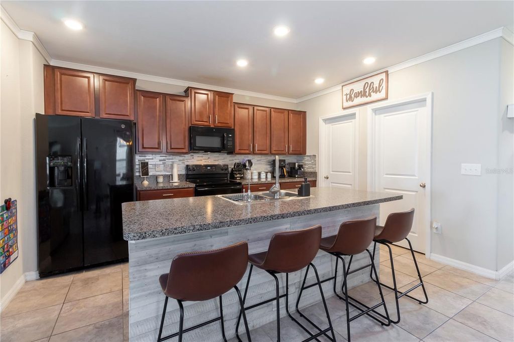 Photo of 10235 Carloway Hills Drive, Wimauma, FL 33598 (MLS # TB8417021)