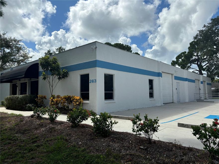 Located at 263 Field End Street in Sarasota, FL, this expansive office/warehouse spans a generous 6,000 square feet and is strategically positioned on a 30,000 square foot lakefront lot. This property is a sublime mix of functionality and location, providing a robust setting for commercial prospects.
As you approach the property, the exterior exudes professionalism with its sleek facades accented by striking blue trim. The landscaping is thoughtfully maintained, offering a welcoming first impression that mirrors the business potential within.
Upon entering, you’re greeted by an ample reception area that introduces you to the property’s professional atmosphere. This space is inherently adaptable, designed to guide clients to the five enclosed offices/conf. room, or alternatively, serve as a waiting area for visitors. The offices are neatly arrayed to encourage productivity and collaboration, while three accessible bathrooms ensure convenience and comfort for employees and guests alike.
The heart of the facility is the versatile warehouse area, complete with high ceilings and robust structural integrity, ready to accommodate a diverse range of business activities. Storage, inventory management, and additional workspace – all are feasible within this broad and flexible environment.
This property is uniquely efficient, featuring two grade-level and two dock-level bays, each engineered to support smooth logistical operations. These features are invaluable for businesses requiring regular shipping and receiving capacities, making this a prime location for operational excellence.
Strategically located just 3 miles east of I-75, you have direct access to the buzzing hub of the International Trade Center, along with easy ingress to Waterside and Lakewood Ranch. This connectivity places your business in the very pulse of Sarasota’s commercial vitality.
Overall, the functional layout, coupled with the prime location, makes 263 Field End Street not just a workplace, but a center for potential growth and opportunity in one of Florida’s thriving economic landscapes.