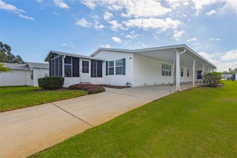 Photo of 606 Mooring Lane, Edgewater, FL 32141 (MLS # O6366810)