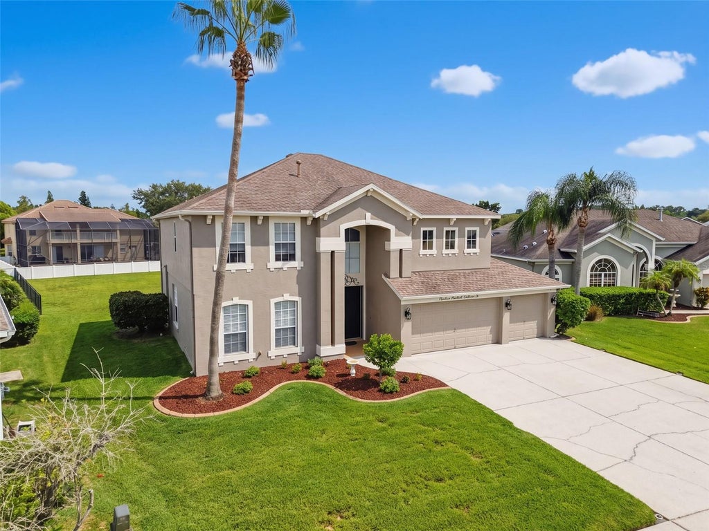 Photo of 1900 Cardamon Drive, Trinity, FL 34655 (MLS # W7888913)