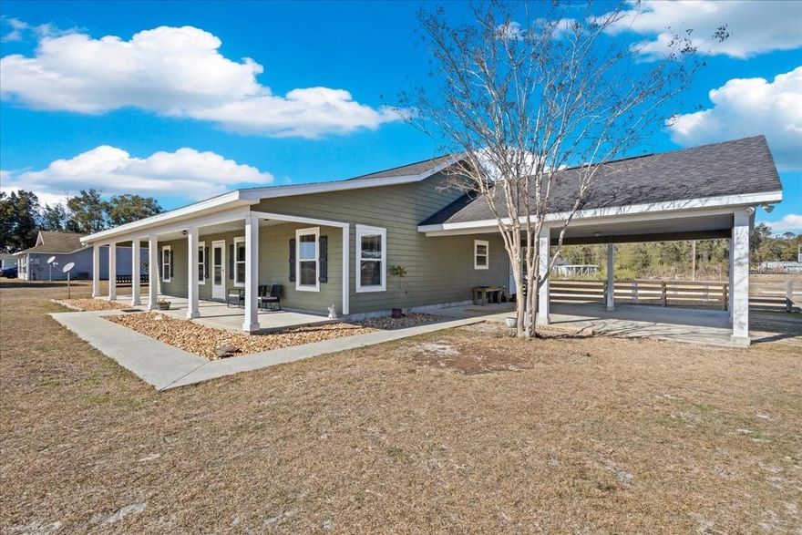 THIS is the home sweet home you've been waiting for. A gorgeous 2016 custom built home on 1.1 acres located conveniently between Chiefland and Fanning Springs. This home has the perfect property for low maintenance. As you enter the property you will love the 2 car oversized carport , wonderful front patio leading you to the entrance. As you enter the home you see a bright open floor plan, laminate flooring throughout the main living area, dining with pantry and kitchen with gorgeous custom wood cabinetry . All appliances are new! A true split floor plan with guest bedrooms and guest bathroom on one side and large master, dual closets and master bathroom with a walk in shower and dual vanities. The home has gorgeous den area perfect for a play room, office or extra sitting area. A large mud room with cabinetry and washer and dryer included and sink. Back porch is screened perfect to enjoy the beautiful Florida weather. Back yard is fenced perfect for kids and animals , with a few storage buildings for all your storage needs. Accepting ALL loan types and cash! Call today for YOUR tour! LENDER CREDIT of $1,500 being offered with preferred lender!