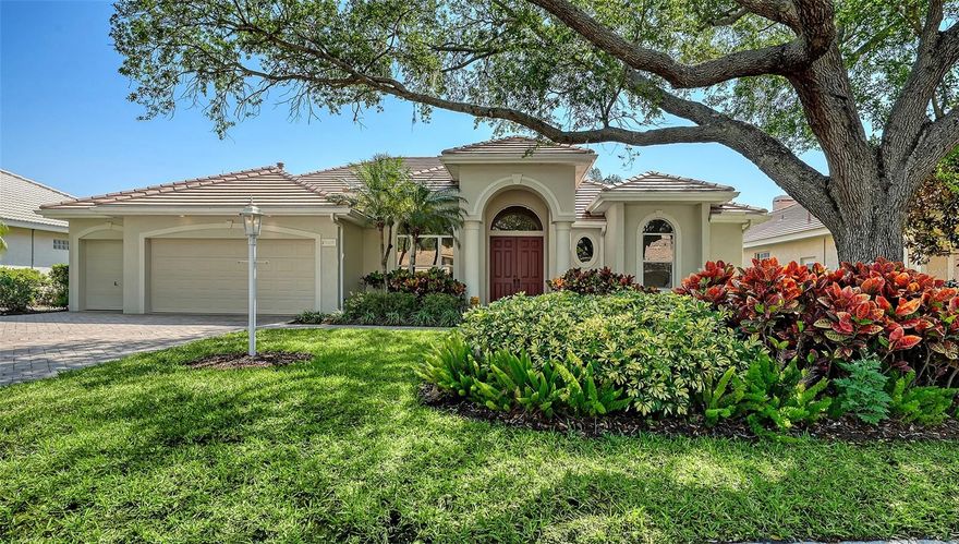 One or more photo(s) has been virtually staged. Eaton Place is ideally located in the heart of University Park Country Club. Very well-maintained LAKE FRONT 4 bedroom residence offers an exceptional blend of timeless elegance and thoughtful updates. NEW ROOF (2023) GENERATOR (2020), A/C system (2019), GARAGE DOOR (2019), accordion STORM shutters, and tinted windows. POOL & SPA RESURFACED & RE-TILED (2026). Brick-paver driveway and walkway, covered entry and refreshed landscaping, along with a two-car garage PLUS GOLF CART GARAGE. Spacious and well-designed split floorplan, the home is filled with natural light, enhanced by tall ceilings, neutral finishes, large format porcelain tile and luxury vinyl plank flooring and expansive living spaces. Formal living and dining rooms provide an inviting setting for entertaining, while the family room centers around a gas fireplace and sliding glass doors-flowing to the outdoor living areas. Chef’s kitchen is beautifully appointed with quartz countertops, modern cabinetry with abundant built-ins, large center island plus breakfast bar seating, and stainless-steel appliances including a Sub-Zero refrigerator and Wolf gas range and convection microwave. Charming breakfast nook with aquarium window frames tranquil views. The private primary suite features a seating area, direct lanai access, and a spacious walk-in closet. The updated primary bath offers dual vanities, granite countertops, walk-in shower, and a soaking tub. Guest accommodations are thoughtfully arranged, including a pocket-door wing with two bedrooms and a full bath, as well as an additional bedroom and bath at the rear of the home for enhanced privacy. Impressive outdoor living with an oversized screened lanai, resort-style pool and spa, and two covered patio areas ideal for dining and relaxation. All overlooking serene lake views. A spacious laundry room with extensive cabinetry, utility sink, LG washer and dryer, and built-in storage adds everyday convenience. Residents of University Park Country Club enjoy access to 27 holes of championship golf, tennis and pickleball courts, fitness center, croquet, and a vibrant social calendar. Ideally located just minutes from downtown Sarasota, world-class beaches, fine dining, shopping, and cultural attractions, as well as the nearby Sarasota-Bradenton International Airport. This is true Florida living in one of Sarasota’s premier gated country club communities, known for its exceptional amenities, optional membership opportunities, and convenient access to everything the area has to offer.