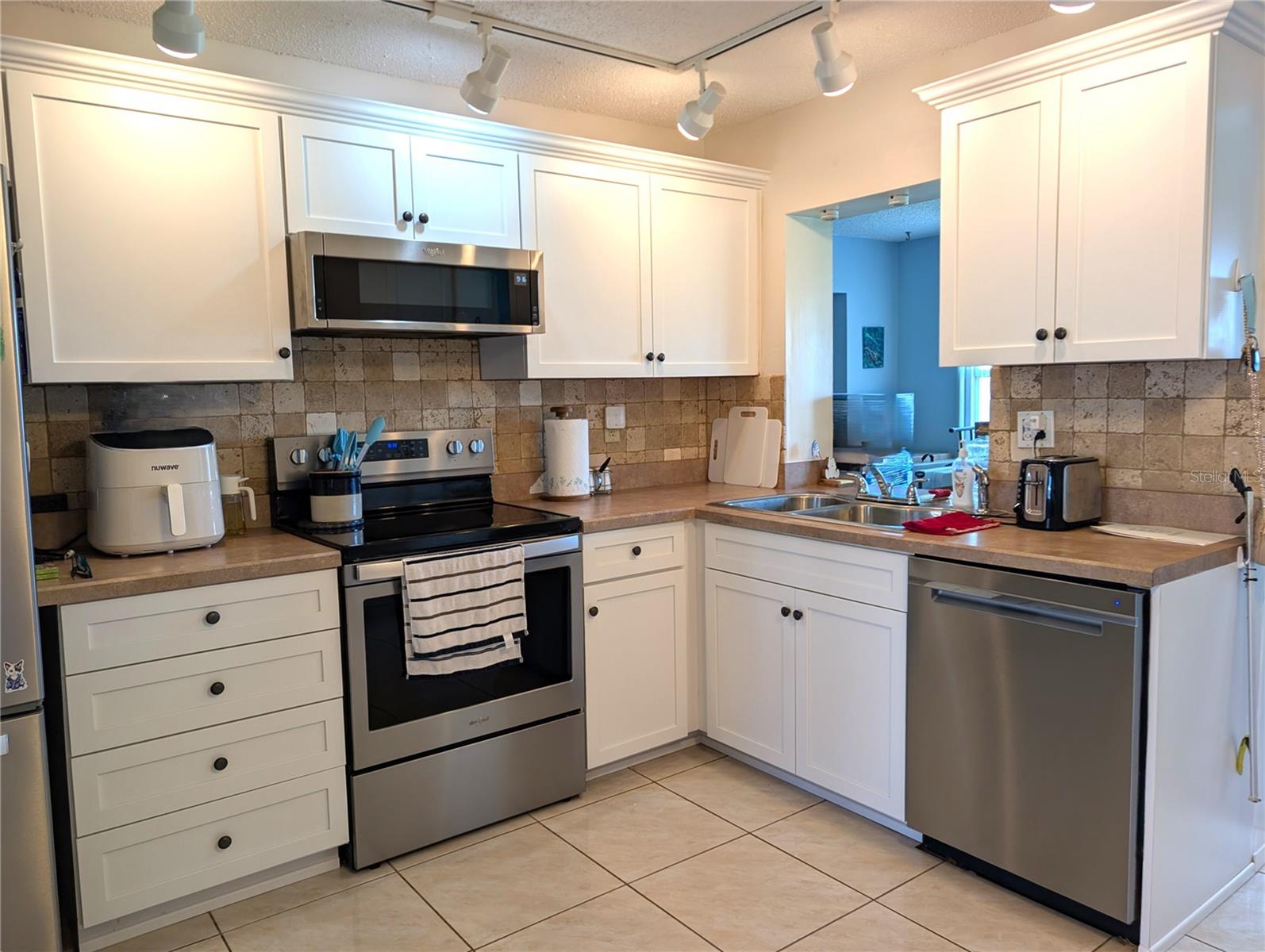 MAINLANDS OF TAMARAC BY THE GULF UNIT 4 CONDO - Residential