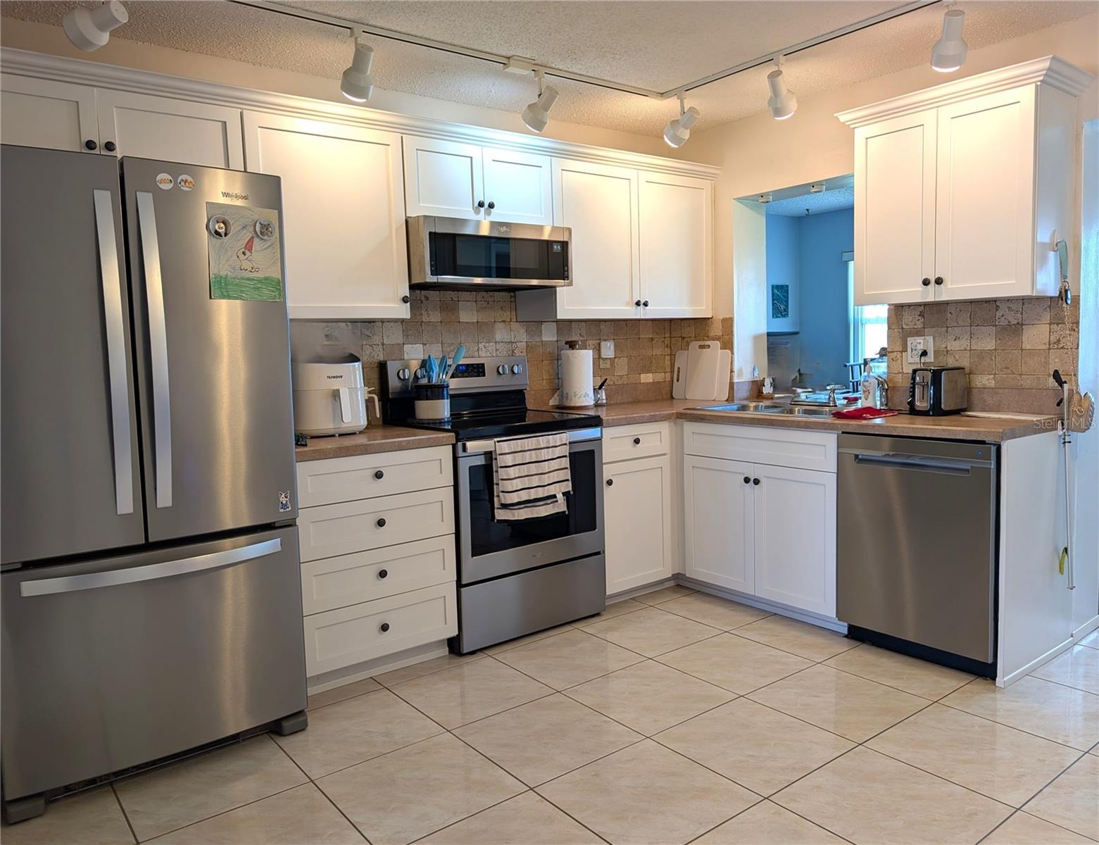 MAINLANDS OF TAMARAC BY THE GULF UNIT 4 CONDO - Residential