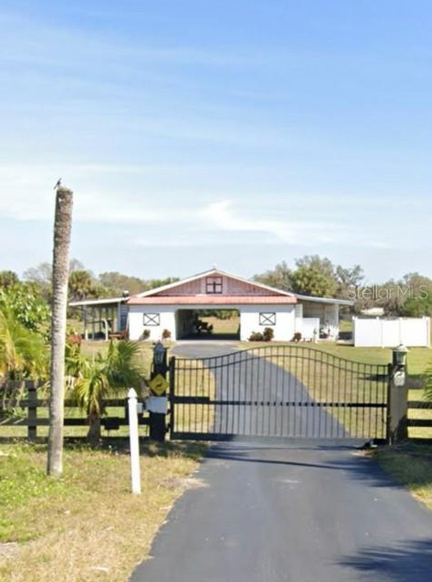 Set on a rare 10-acre expanse made up of two neighboring 5-acre lots, this outstanding equestrian property delivers both convenience and top-tier functionality. Just a short drive from town, local beaches, and popular show venues, it’s ideally positioned for riders who want easy access without sacrificing space or privacy.

At the heart of the property is a fully equipped barn designed with both horse and handler in mind. It includes 10 spacious stalls—each outfitted with water access, proper airflow, rubber flooring, and automatic misting systems—along with three wash areas, a climate-controlled tack room, dedicated feed storage, and a private office.

The outdoor amenities are equally impressive, featuring a full-size dressage arena built to Olympic standards with quality footing and efficient drainage, a lunging ring, a hot walker, and eight irrigated paddocks. The entire property is enclosed with sturdy, well-maintained fencing, ensuring safety and durability.

For added convenience, there’s a concrete pad ready for RV or trailer use—ideal for those who travel frequently for events or competitions. Located just a short drive to Venice Island’s coastline, this property blends professional-grade facilities with an unbeatable lifestyle setting.

Whether your focus is training, boarding, or simply enjoying a private equestrian retreat, this turnkey facility is ready to accommodate. Seller financing options may also be available.