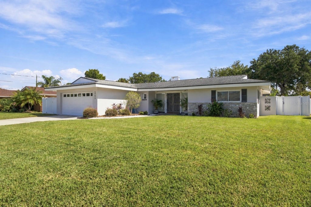 Photo of 1721 Harbor Circle W, Largo, FL 33770 (MLS # TB8561961)