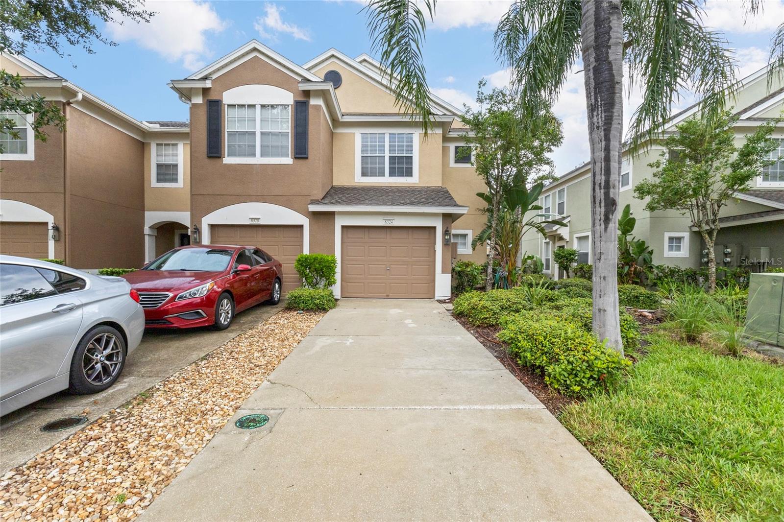 One or more photo(s) has been virtually staged. A meticulously maintained, priced-to-sell fast end-unit townhouse nestled within the gated, Sabal Bay community, this beautiful three-bedroom, two-and-a-half-bath home offers the perfect blend of comfort and convenience. Just steps from the heated community pool, playground, and cabana within lush, tropical landscaping, the home features a bright, open floor plan with high ceilings, tile and carpet flooring, a screened porch perfect for enjoying Florida weather, and generous living spaces. The location is truly unbeatable—walking distance to Whole Foods, premier shopping and dining at the Mall at University Town Center, plus quick access to Nathan Benderson Park, I-75, the airport, and Siesta Key’s beaches—making everyday life and weekend adventures effortless. Priced well and designed for immediate sale, this turn-key home delivers a rare opportunity for smart, lifestyle-focused buyer.