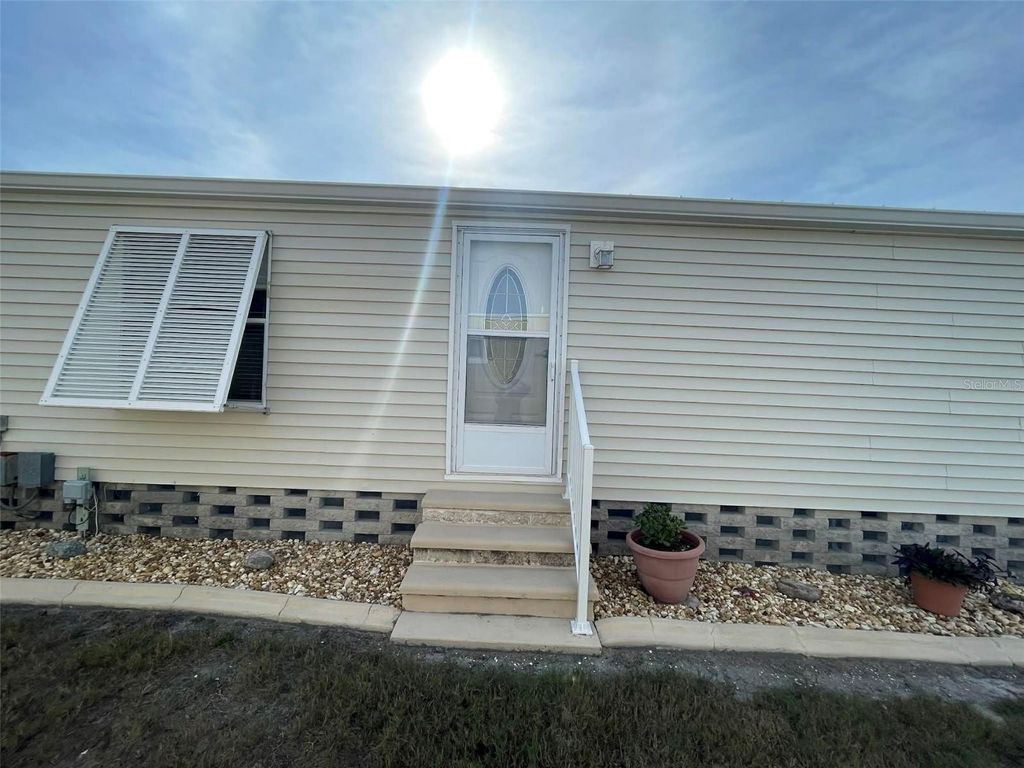 Photo of 6682 Hikina Drive, North Port, FL 34287 (MLS # C7520140)