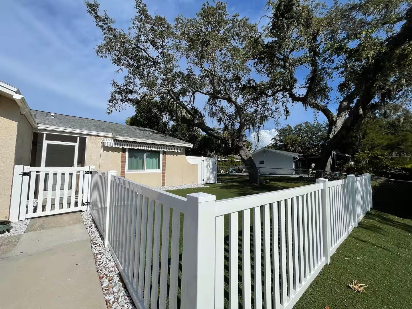 Photo 1 of 50 — 2107 GROVE VALLEY AVENUE, PALM HARBOR, FL 34683