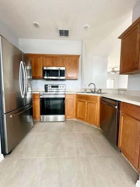 Photo of 4903 Waterside Pointe Circle, Orlando, FL 32829 (MLS # O6431618)