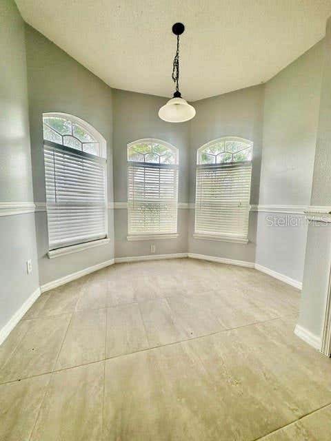 Photo of 4903 Waterside Pointe Circle, Orlando, FL 32829 (MLS # O6431618)