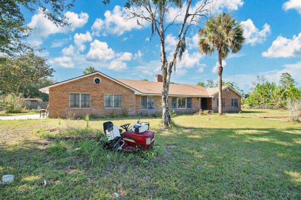 Photo of 348 Summerville Lane, Sanford, FL 32771 (MLS # O6352990)