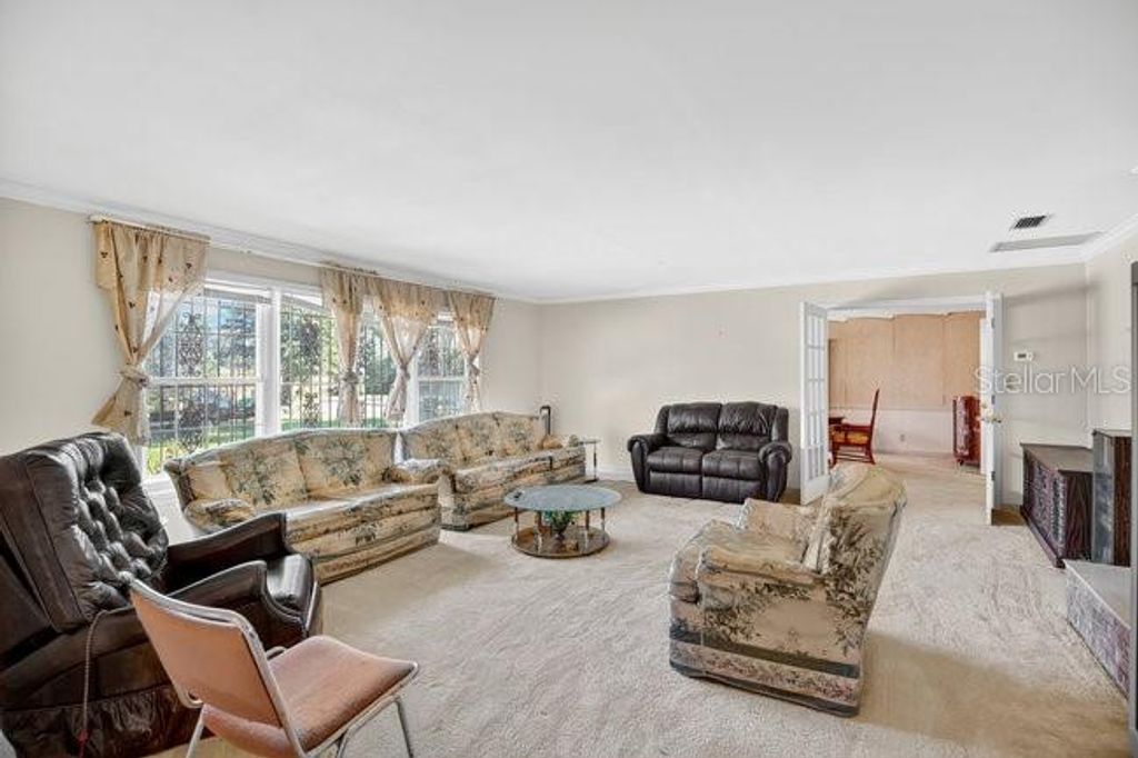 Photo of 348 Summerville Lane, Sanford, FL 32771 (MLS # O6352990)