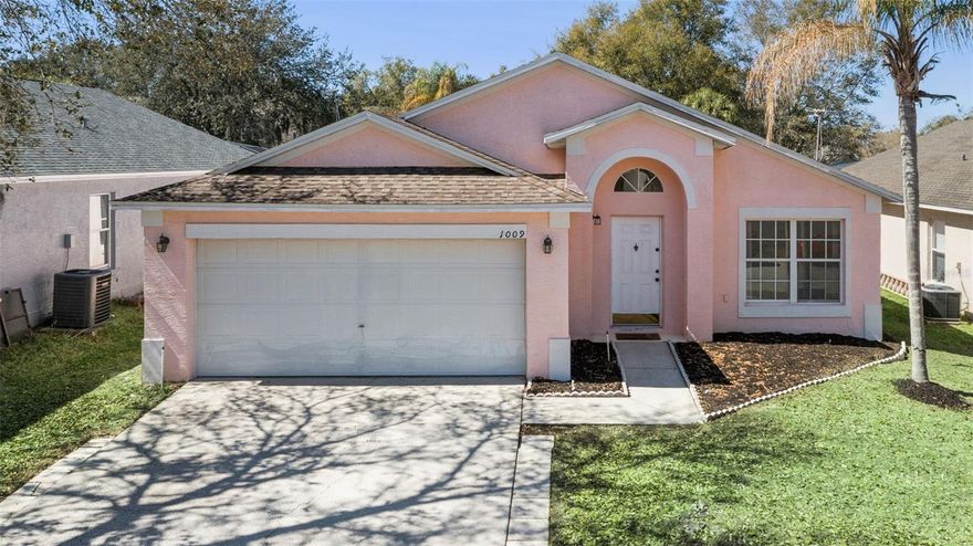 Pretty in pink and full of Florida sunshine! This 5-bedroom, 3-bathroom pool home is located in desirable Clear Creek and features a spacious triple-split bedroom design, offering both privacy and space for everyone in the house. Step in to the sun-filled living room with fresh paint throughout, vaulted ceilings and an open, inviting layout enhances the sense of space and comfort. The spacious eat-in kitchen offers two pantries, providing well-organized storage and making meal prep easier for the home chef. The private primary suite, secluded at the back of the home, includes a generous walk-in closet and a large ensuite bath. Four additional bedrooms provide plenty of space for family or guests. Sliding doors lead out to the sparkling screened-in Pebble Tec pool and deck—which is the perfect spot to unwind or entertain on sunny days. The roof was replaced in 2018, and the backyard features mango and avocado trees, adding a touch of Florida flavor to your outdoor space. The Clear Creek community allows short-term rentals and is ideally located just 20 minutes from theme parks, with easy access to SR-429, the Turnpike, and I-4, plus convenient proximity to shopping, dining, entertainment, and Lake Louisa State Park. Whether you’re looking for a primary residence, starter home, vacation home, or income property, this retreat offers the perfect combination of comfort, convenience, and tropical charm. Schedule your private showing today and make your Florida dream a reality!