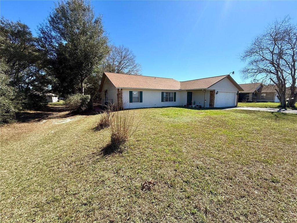 Photo of 13718 SW 40th Circle, Ocala, FL 34473 (MLS # OM720355)