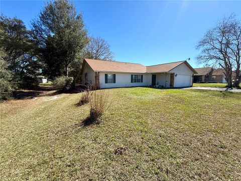 Photo of 13718 SW 40th Circle, Ocala, FL 34473 (MLS # OM720355)