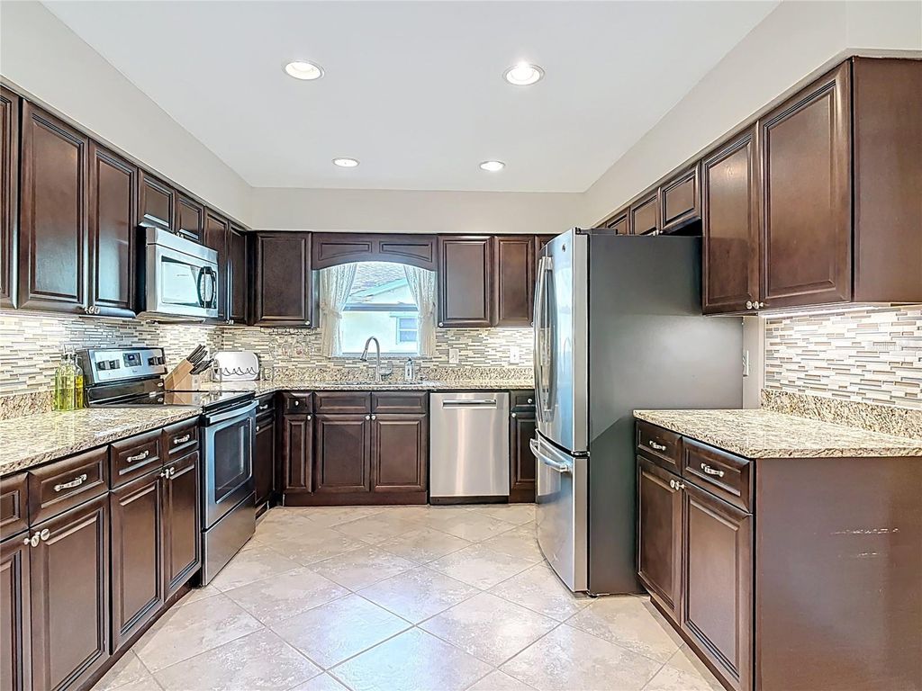 Photo of 1712 Needle Palm Drive, Edgewater, FL 32132 (MLS # NS1087804)