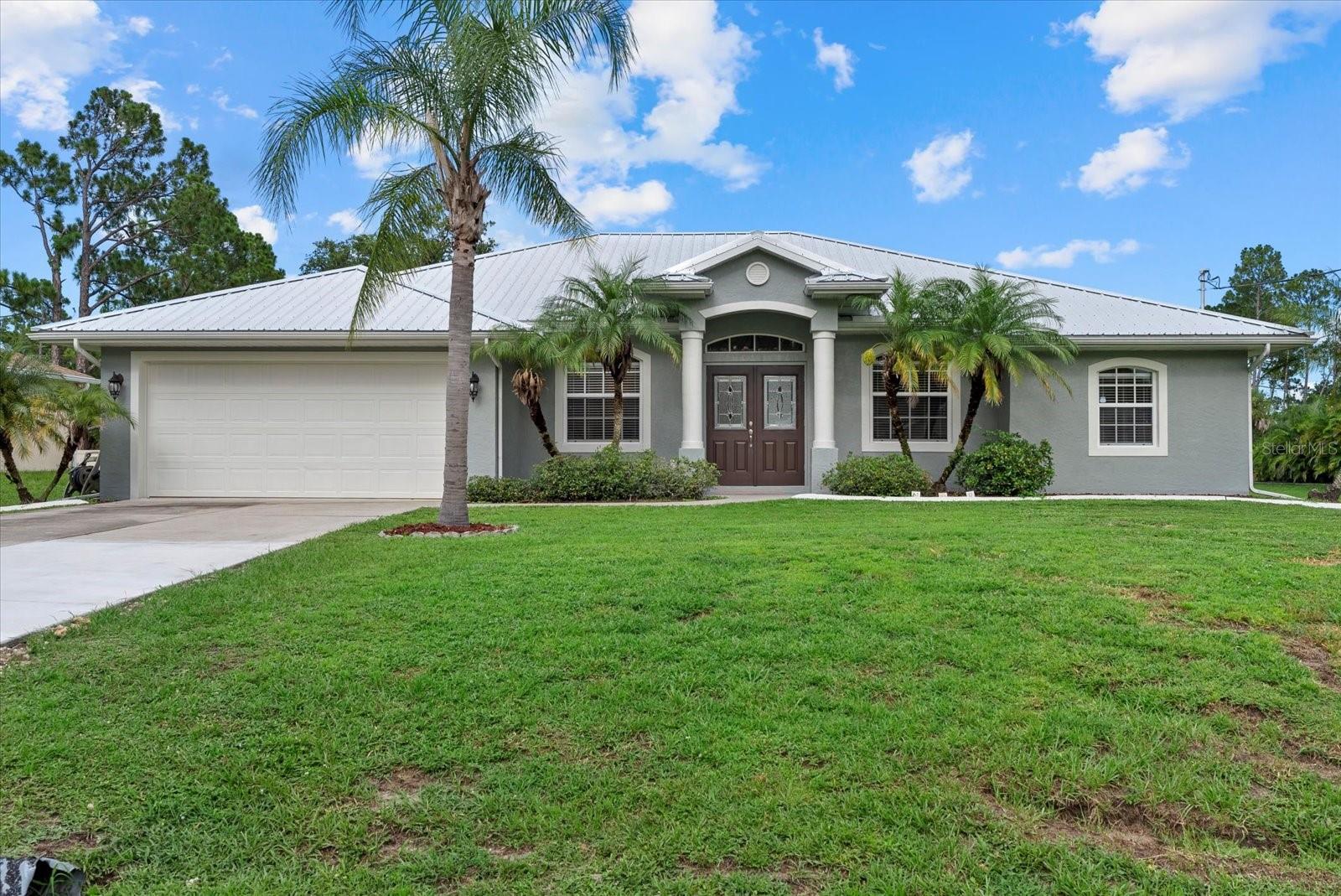 Welcome to 4992 Maurbach Terrace—a beautifully maintained 3-bedroom + DEN, 2-bath POOL home with a NEWER METAL ROOF, offering 1,857 sq ft of living space (2,594 total sq ft) on a desirable corner lot in the heart of North Port, with CITY WATER.
Inside, you'll find a bright and open split floor plan with BRAND NEW CARPET, fresh neutral tones, and a seamless flow from the main living area to the kitchen and dining spaces. The kitchen features newer stainless steel appliances, a breakfast bar, and a cozy nook overlooking the pool.
The spacious primary suite includes sliding glass doors to the lanai, dual closets, and an en-suite bath with double vanities, a soaking tub, and a separate shower. Two additional bedrooms share a full guest bath, while the den provides flexible space for an office, playroom, or guest room.
Enjoy outdoor living year-round in the oversized screened lanai with a large pool and ample covered patio space. Additional highlights include a freshly painted exterior, gutters around the entire home, an interior laundry room,mature landscaping and a backyard storage shed for extra convenience.
Conveniently located just minutes from shopping, dining, parks, schools, US41 and I-75.