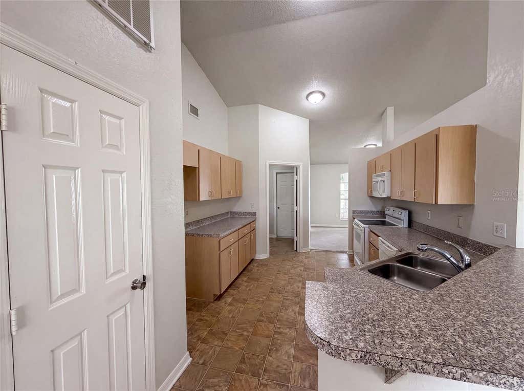 Photo of 1038 Highland Crest Circle, Lake Wales, FL 33853 (MLS # O6429355)