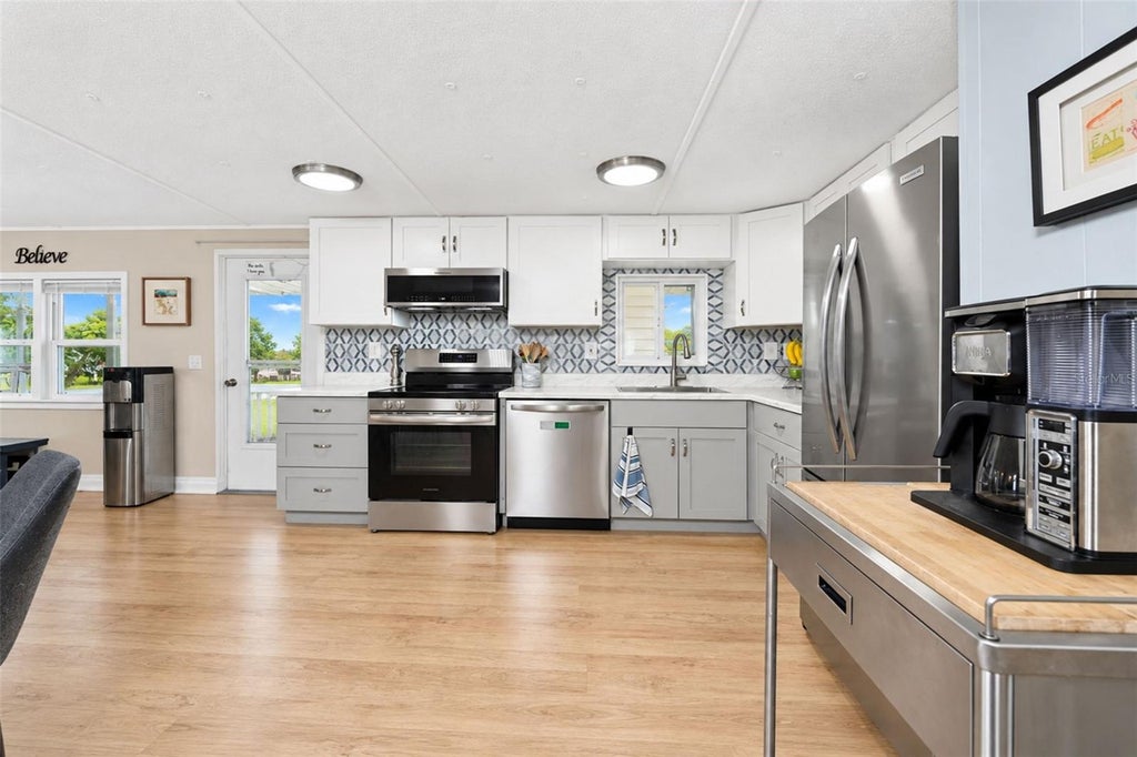 Photo of 7333 Varley Circle, Port Charlotte, FL 33981 (MLS # C7531773)