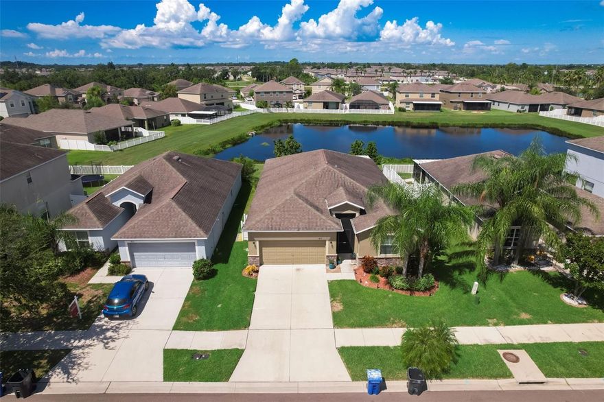 You have to see this Hamilton floor plan located in the gated community of Hawk’s Point in the heart of Ruskin. There are 4 bedrooms, 3 baths and a 2 car garage. Wait until you see how amazing it shows!  You can see the pride of ownership at every last turn.  In the kitchen you will find all stainless steel appliances, granite counter tops, maple cabinets and crown molding. The master suite is large and has a great master bathroom equipped with dual sinks, a garden tub, a brand new standalone shower and plenty of storage with 2 walk in closets. There are 3 Additional bedrooms and one of them offers an en-suite bathroom which can be used as a multi generational/mother in law suite. There is a large covered screened in lanai out back with views of the water and is great for these cooler fall evenings.  Hawks Point offers so many amenities like swimming pools, playgrounds, dog parks, a clubhouse with conservation land throughout and ponds located all over the community.