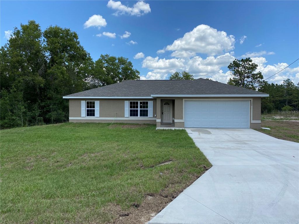 Photo of 157 Malauka Loop, Ocklawaha, FL 32179 (MLS # O6384464)