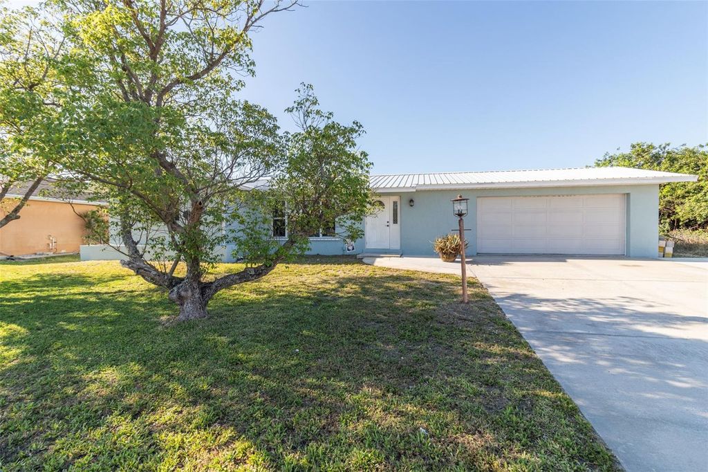 Photo of 22465 Lewiston Avenue, Port Charlotte, FL 33952 (MLS # TB8473147)