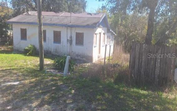 Auction Property. AUCTION. Selling as land only. Current structure is a possible tear down and features 2 beds, 1 bath. Home sits on approximately a 5200 sq ft lot. Grab your custom design ideas and make this one your next project. Property is sold as-is with no property disclosure or inspection reports. BOARDED - NO ACCESS to structure due to unsafe conditions.