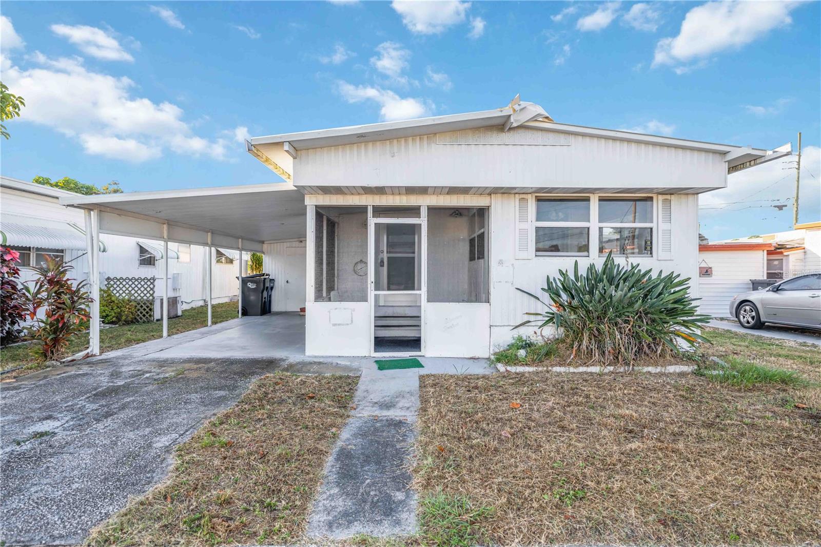 Discover this inviting 2-bedroom, 1.5-bath manufactured home nestled in a neighborhood in the center of Bradenton. Offering comfort and convenience, this home features a functional layout with plenty of natural light and cozy living spaces. Enjoy being close to shopping, dining, and all that Bradenton has to offer. Come take a look and see how you can make this lovely home your own!