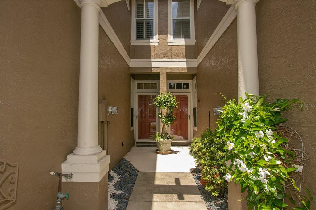 Photo of 3326 Covered Bridge Drive W, Dunedin, FL 34698 (MLS # TB8505521)