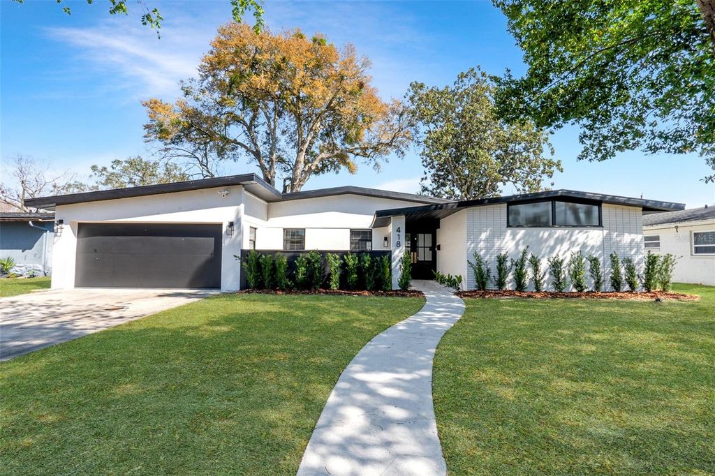 Photo of 418 Gilbert Road, Winter Park, FL 32792 (MLS # O6385950)