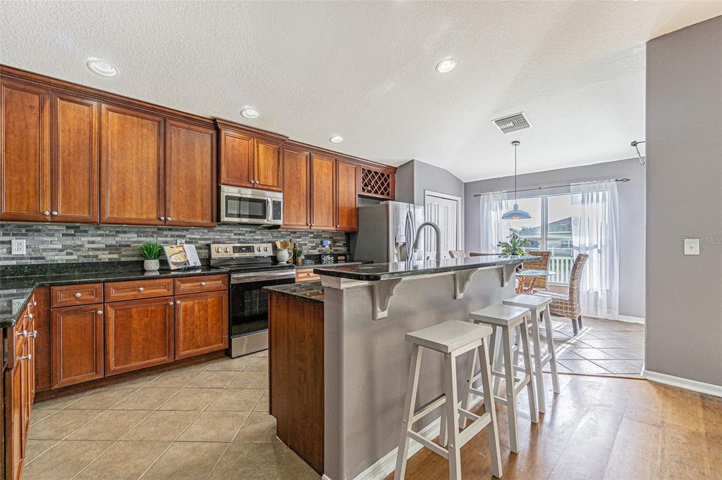 Photo of 6843 Runner Oak Drive, Wesley Chapel, FL 33545 (MLS # TB8415363)