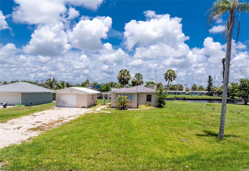 Photo of 1899 Riverside Drive, Englewood, FL 34223 (MLS # D6143009)