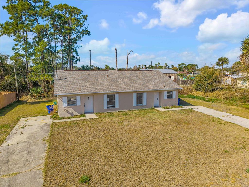 Photo of 1930 Fern Palm Drive, Edgewater, FL 32141 (MLS # NS1087532)