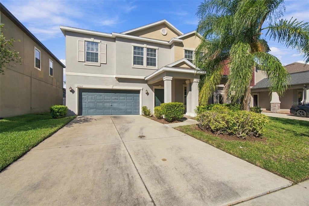 Photo of 12317 Ballentrae Forest Drive, Riverview, FL 33579 (MLS # TB8559428)
