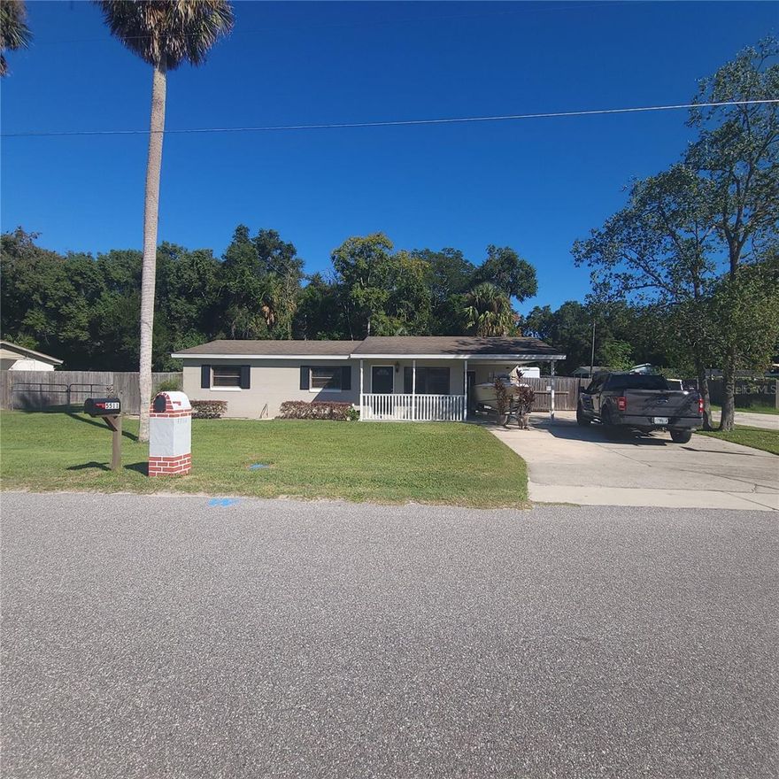 This is a solid block, well-maintained 3-bedroom, 1-bath home with an interior laundry room, situated on a corner lot with a backyard perfect for storing your boat or RV. You’ll be impressed by the crown molding and craftsmanship throughout the home. Enjoy the charm of a quiet small-town neighborhood. Zellwood is nestled in Northwest Orange County between Apopka and Mt. Dora, offering plenty of shops and restaurants to explore. With NO HOA to worry about, the fully wood privacy-fenced yard with a drive-thru gate provides ample space and convenience.  Home has an existing FHA appraisal good for 6 months at $280,000.