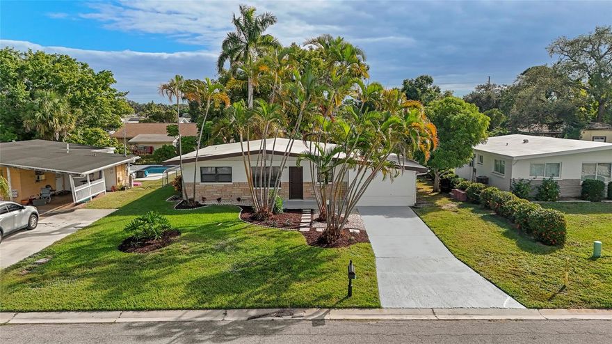 Welcome to 5619 New York Avenue, a charming Sarasota retreat where comfort, style, and convenience come together beautifully. Nestled in a quiet neighborhood with no HOA, this home offers the freedom to truly make it your own while being just minutes from Siesta Key Beach, Downtown Sarasota, and all the coastal lifestyle has to offer.

As you arrive, refreshed tropical landscaping and a welcoming curb appeal set the tone. Step inside to find a bright, open layout designed for easy living and connection. Natural light fills every corner, reflecting off tile floors that create a clean and calming atmosphere. The kitchen opens to the living space, perfect for entertaining or relaxed family gatherings, while large sliding doors invite you to step outside and experience the home’s centerpiece, your private backyard oasis.

Out back, the sparkling pool is surrounded by lush greenery, offering a peaceful escape where you can unwind, host weekend barbecues, or simply soak up the Florida sun. The fenced yard provides privacy and room for pets or gardening, creating a perfect blend of relaxation and functionality.

Whether you are looking for a full time residence, a seasonal getaway, or an investment opportunity, this home captures what makes Sarasota living so desirable. You are close to the area’s top beaches, shopping, dining, and cultural attractions, yet tucked away in a neighborhood that feels like your own personal retreat.

This is your chance to own a pool home in Sarasota that combines character, comfort, and location while giving you the freedom of no HOA restrictions. Experience the lifestyle you have been dreaming of at 5619 New York Avenue.