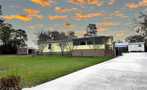 Photo of 655 SE 162nd Terrace, Silver Springs, FL 34488 (MLS # OM720696)