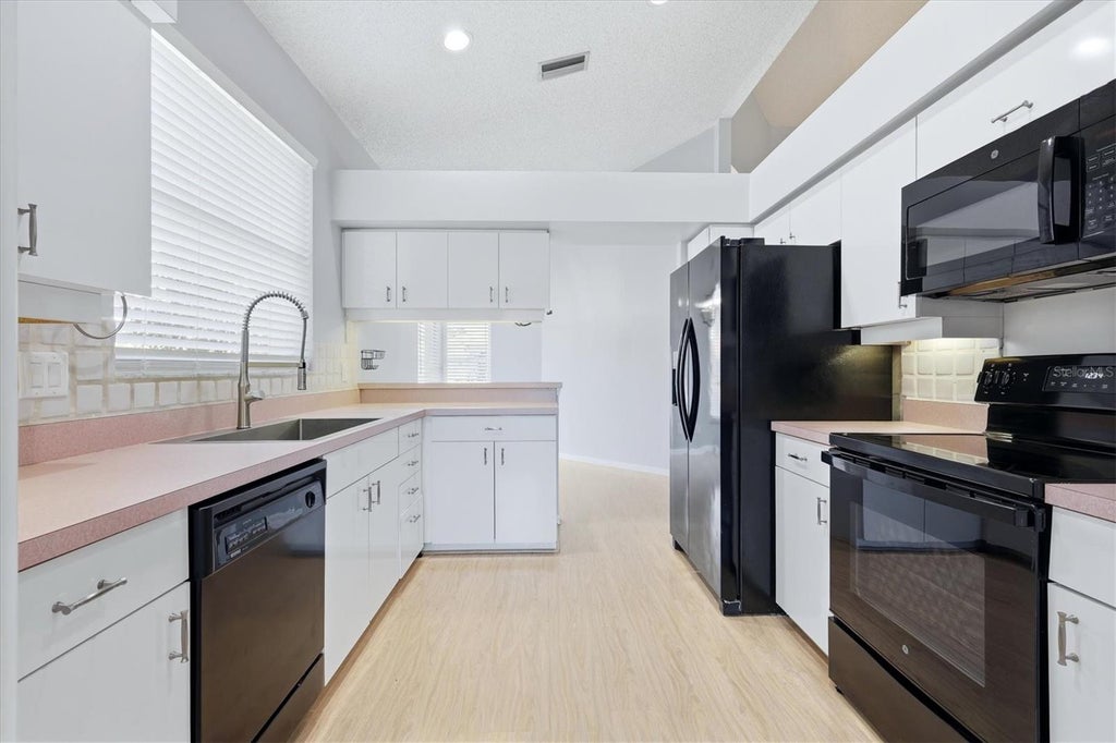 Photo of 4636 Deer Trail Boulevard, Sarasota, FL 34238 (MLS # A4698629)