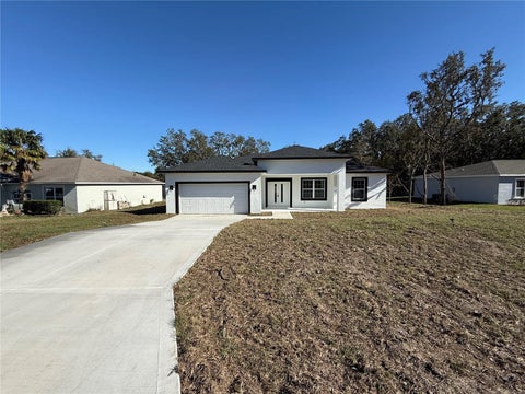 Photo of 7897 N Fieldstone Drive, Citrus Springs, FL 34433 (MLS # O6412348)