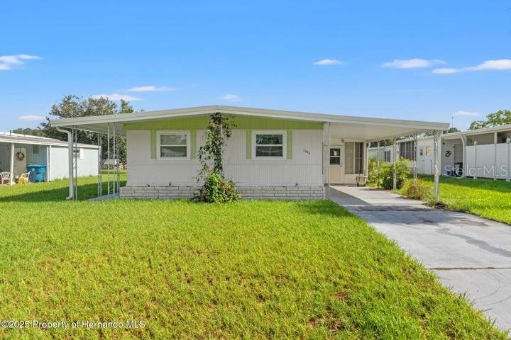 RARE 3-BEDROOM in Brookridge - Where YOU Own the Land! Welcome to 7444 Moriah Avenue — a charming, FURNISHED 3-BEDROOM home tucked inside the sought-after 55+ GUARD-GATED GOLF COMMUNITY of Brookridge, where one of the biggest perks is this: YOU OWN THE LAND! That's right — no lot rent here!
This home checks all the boxes for low-maintenance living with major upgrades already done for you. BRAND-NEW TPO ROOF (2023), NEW IMPACT WINDOWS (2023), NEW AC (2021) and a newer hot water heater mean peace of mind for years to come. Step inside to find new flooring, a bright and open layout, and a spacious SCREEN-ENCLOSED PATIO perfect for morning coffee or evening chats.
Need storage or a workshop? You'll love the UTILITY/LAUNDRY ROOM plus TWO ADDITIONAL UTILITY ROOMS — the perfect space for hobbies, tools, or even a craft studio. There's also a COVERED CARPORT to keep your car protected from the Florida sun.
Located just minutes from the FRONT GATE and CLUBHOUSE, this home offers one of the most convenient spots in the neighborhood!
Brookridge is a master-planned, deed-restricted 55+ community located in beautiful Brooksville on Florida's Nature Coast. Enjoy 24/7 guard-gated security, plus access to a clubhouse, HEATED POOL, GOLF COURSE, TENNIS COURTS, FITNESS CENTER, and TONS of clubs and activities that make it easy to get involved and make new friends. And the HOA? Just 50/month!
Homes like this — especially with land ownership and all the big updates already done — don't come along often.
Come see what Florida dreams are made of.
You're going to love it here.