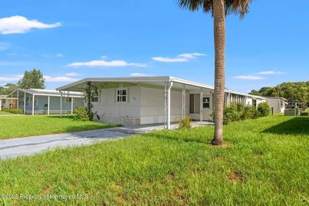 Photo of 7444 Moriah Avenue, Brooksville, FL 34613 (MLS # W7877325)