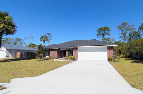 Photo of 67 Royal Oak Drive, Palm Coast, FL 32164 (MLS # FC313520)