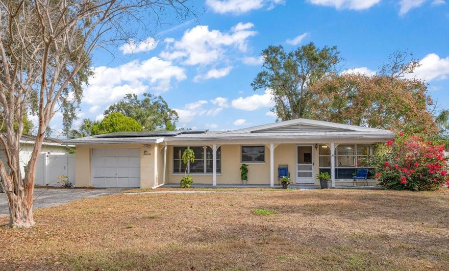 Fabulous Home in Established Clearwater Neighborhood just Minutes to Gorgeous Clearwater Beach & Downtown Clearwater. Features Newer Roof (2021), Solar Panels (2024 - to be paid off at closing), HVAC (2016). Ceramic Tile Throughout. Large Dining Room will Accommodate a Table for 10. Huge Sun Room. Spacious Kitchen with Loads of Pantry Space. Block Construction. Fenced Yard with Shed/Workshop. This Home Will Surely be the Most Desired Gathering Place for Your Family & Friends.