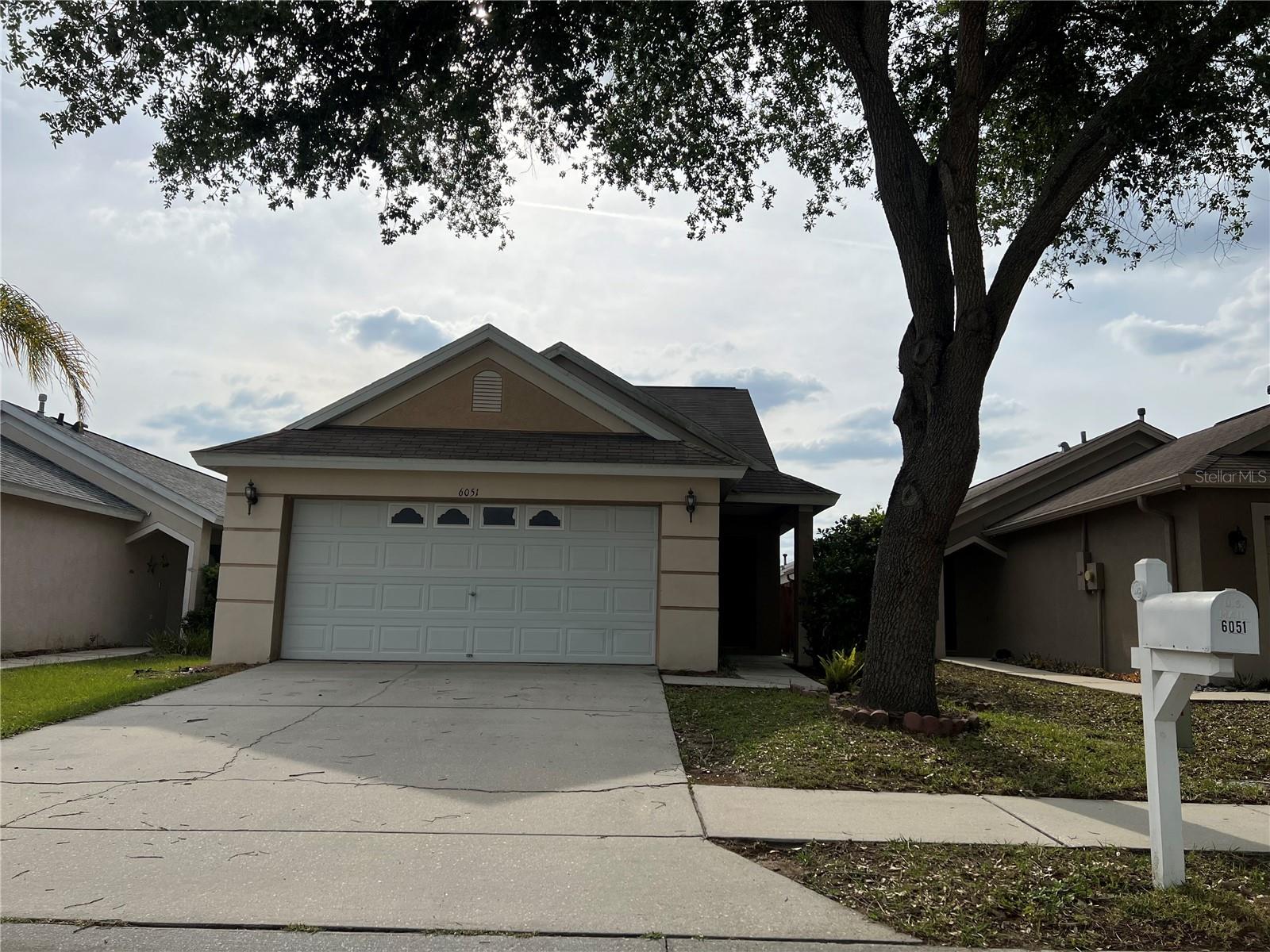 Location! Location! Location! Come explore this amazing 4Bed/2Bath home in the GATED community of Wesley Pointe. The home boasts laminate flooring downstairs, carpet upstairs and fully fenced yard for your privacy. Master bedroom and bathroom is downstairs, 3 additional bedrooms and bathroom upstairs. The community contains a playground, low HOA fees and no CDD fees. Conveniently located in the heart of Wesley Chapel, you'll be extremely close to Wiregrass mall, Tampa Premium Outlets, shopping, restaurants, I-75 access and much more!