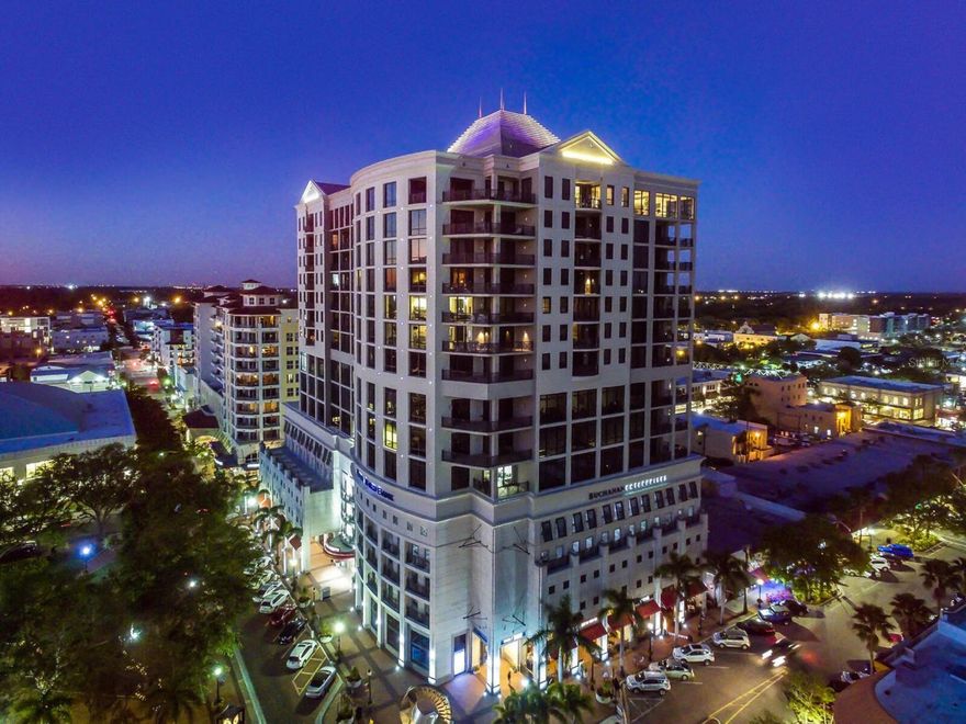 A sophisticated vantage point, located in the heart of downtown Sarasota! This spectacular corner unit penthouse residence features floor to ceiling windows that fill the residence with light, while offering bay views with sunset vistas. A modern design with exquisite finishes showcases multiple spaces to entertain, including a custom built-in wet bar and fireplace, surrounded by high ceilings and open spaces. The well-equipped kitchen boasts Italian cabinetry, quartz and mosaic tile countertops, a large island and glass backsplash. The main bedroom suite offers separate baths, walk-in closets and a private terrace. There are two additional bedrooms with private baths, one is currently used as a game/exercise room with a wall Murphy bed. Building amenities are abundant and include concierge, private lobby entrance, valet, service, club room, catering kitchen, conference room, guest suite, fitness center, rooftop terrace, pool, spa and grill. Two garage parking spaces are included, as well as an air-conditioned storage room. Pet friendly for large pets. All just steps to downtown shopping, dining and cultural activities. Plaza at Five Points is a sought after building and this residence is a unique opportunity to be in Sarasota’s premier location.