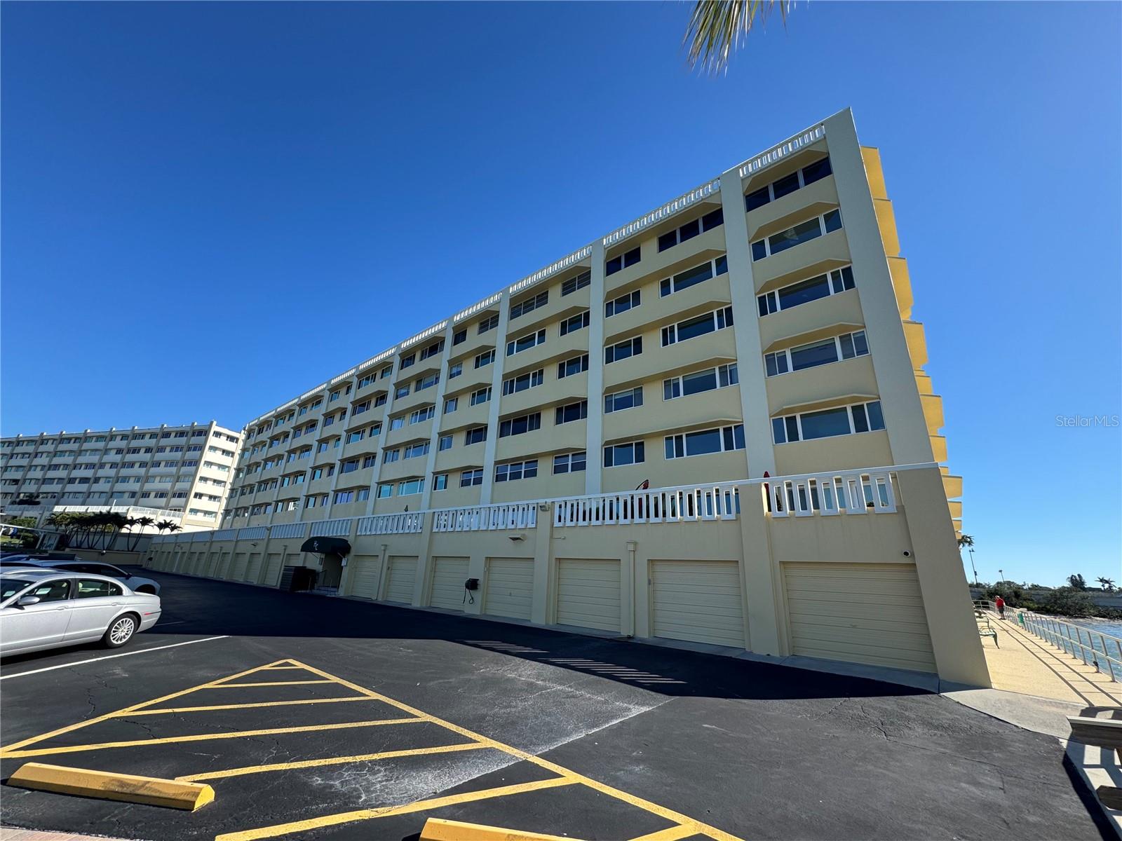 FLORIDA WATERFRONT LIVING AT ITS FINEST!!! SPECTACULAR HARBOUR CLUB C BUILDING 5TH FLOOR FURNISHED CORNER END UNIT. FABULOUS 1900 SQUARE FEET OF LIVING SPACE INCLUDED WITH THIS GORGEOUS CORNER END UNIT.STUNNING PANORAMIC INTRACOASTAL WESTERLY VIEWS THROUGHOUT .KITCHEN FEATURES STAINLESS STEEL APPLIANCES, WOOD CABINETRY AND A NEARBY CLOSET PANTY. BEAUTIFULLY UPDATED TRAVERTINE AND ENGINEERED WOOD FLOORING THROUGHOUT.UPDATES HAVE BEEN ADDED TO ALL 3 BATHS.HUGE FAMILY ROOM AND LIVING ROOM FEATURING OUTSTANDING FULL WESTERLY WATER VIEWS AND PLENTY OF ROOM FOR ENTERTAINING.ELEGANT FORMAL DINING SPACE LOCATED NEAR KITCHEN.SPACIOUS 19X12 MASTER BEDROOM SUITE OFFERS MAGNIFICENT FULL WESTERLY WATERVIEWS,UPDATED MASTER BATH W/FRAMELESS GLASS ENCLOSED WALK IN SHOWER,UPDATED CABINETRY W/GRANITE COUNTERTOPS AND HIS & HER WALK IN & WALL CLOSETS.LARGE SECOND BEDROOM SUITE 17X12 ALSO WITH EXCEPTIONAL INTERCOASTAL WATERVIEWS,PRIVATE UPDATED FULL BATH W/TUB SHOWER COMBINATION,GRANITE COUNTERTOPS AND A WALK IN CLOSET. UPDATED 3RD 1/2 BATH WITH PERFECT LOCATION FOR GUESTS AND FAMILY.SPACIOUS LAUNDRY ROOM WITH WASHER/DRYER AND CABINET STORAGE.PLENTY OF ADDITIONAL CLOSET SPACE WITH THIS UNIT INCLUDED.YOUR OWN 1 CAR GARAGE LOCATED RIGHT NEXT TO THE ENTRANCE TO THE BUILDING!! NEW ENTRY DOOR, WATER HEATER REPLACED IN 2024,APPLIANCES 2022,AC 2022.HARBOUR CLUB HAS IT ALL!! OBSERVATION / FISHING PIER,HEATED SWIMMING POOL,GRILLING AREA WITH PICNIC TABLES,FITNESS CENTER,ACTIVITY /MEETING ROOM WITH KITCHEN,SHUFFLEBOARD AND MORE!! MAINTENANCE INCLUDES CABLE TV,INTERNET,HEATED POOL,EXTERIOR BUILDING AND GROUNDS MAINTENANCE,WATER,SEWER,TRASH,RECREATIONAL FACILITY,ESCROW RESERVE FUND AND POOL MAINTENANCE.EXCELLANT BELLEAIRE BLUFFS LOCATION CLOSE TO THE BEACHES,RETAIL AND GROCERY SHOPPING,MARINAS,RESTAURANTS,GOLF,MEDICAL FACILITIES,HOSPITAL AND MORE!!! UNITS LIKE THIS ONE ARE A RARE FIND!!!